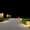 Illuminated Pathway With Modern Square Path Lights And Green Grass At Night