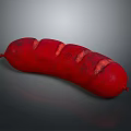Juicy Red Grilled Sausage with Sliced Parts and Crispy Surface on Dark Background