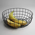 Fresh Ripe Yellow Bananas in Black Wire Basket on Gray Background