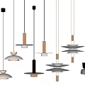 Modern Pendant Lights With Various Designs Hanging On Light Colored Background 3d model