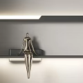 Modern Sleek Strip Wall Light With Metal Sculpture On Black Shelf And Soft Illuminated Wall