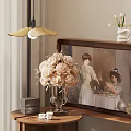 Glass Vase with Pink Peonies on Wooden Table with Vintage Painting and Decorative Box