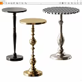Three Different Metal Side Tables With Ornate Bases And Round Tops In Gold Silver Black