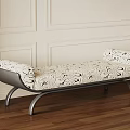 Modern Upholstered Shoe Bench With Floral Pattern Cushion And Metal Legs On Wooden Floor