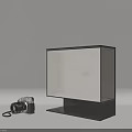 Modern Pendant Light with Minimalist Design and Fabric Shade on Table with Vintage Camera