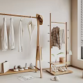 Wooden Clothes Rack With Hanging Clothes Hat Shoes Bag And Plant In Indoor Space