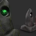 Three Unique Stone Sculptures Featuring Green Gemstone Eyes And Cracked Texture