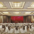 Elegant Banquet Hall Interior With Round Tables White Chair Covers Crystal Chandeliers And Red Backdrop