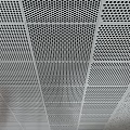 Modern Perforated White Ceiling With Grid Design For Interior Spaces