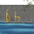 Golden Animal Sculptures by Waterfall with Reflection Near Gray Marble Wall and Green Tree