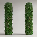 Decorative Vertical Columns Covered With Lush Green Plants And Foliage