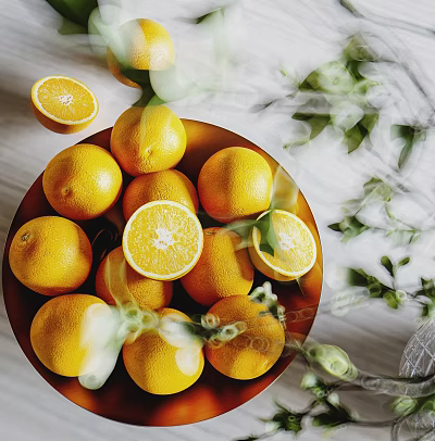 Fresh Ripe Oranges In A Bowl With Whole And Sliced Pieces And Green Leaves 3d model