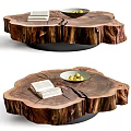Natural Tree Stump Coffee Table With Wood Grain Texture Stack of Books and Fruit Bowl