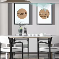 Modern Dining Table Set with White Chairs Hanging Pendant Light and Two Decorative Paintings