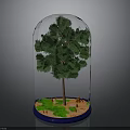 Green Tree Inside Transparent Glass Dome With Green Grass Orange Sand On Blue Base