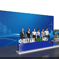 Group Photo Spot at International Energy Transition Forum With Power Towers Wind Turbines Stage Backdrop