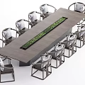 Modern Long Conference Table With Green Centerpiece And Surrounding Accent Chairs