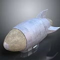 Silver Metallic Bomb Shaped Object Featuring Brown Tip Fins And Textured Surface