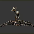 Fawn Standing On A Pile Of Various Colored Leaves In Natural Environment