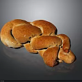 Freshly Baked Braided Bread With Shiny Golden Brown Crust And Soft Texture