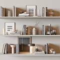 Modern Decorative Ornament Combinations On Shelves With Books Picture Frames Vases Candles And Sculptures