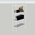 White Multi Tiered Bookshelf With Books Brown Vases Green Plant And Black Folders