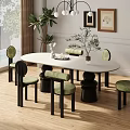 Modern Oval White Dining Table Set With Green Upholstered Chairs And Black Legs