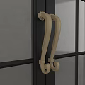 Beige Curved Decorative Door Handles Mounted On Dark Door With Gray Wall Background