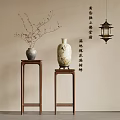 Traditional Decorative Vases With Blossom Branches On Wooden Stands For Home Decoration
