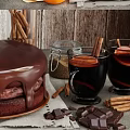 Delicious Chocolate Cake With Chocolate Chunks Cinnamon Sticks Hot Drinks Flour And Orange Slices