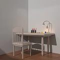 Desk Setup Featuring Desk Lamp Pen Holders Pencils Cone And Blue Sphere