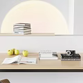 Tabletop Decorative Ornament Set With Stacked Books Apples Open Book Vintage Camera And Warm Lighting