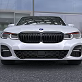 White BMW Sedan With Black Roof Sporty Design And Modern Exterior Features