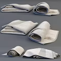 Soft Cotton Towels Neatly Folded and Rolled in Light Gray