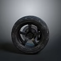 Motorcycle Tire With Black Rubber Tread And Alloy Wheel Rim Design
