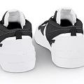 Nike Black And White Low Top Sneakers With White Sole And Lace Up Design