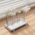 Stainless Steel Kitchen Decorative Storage Rack With Golden Rod And White Base On Wooden Countertop