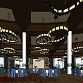 Elegant Banquet Hall Interior With Many Dining Tables Blue Chairs Large Windows And Chandeliers