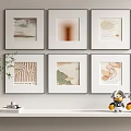 Six Framed Artworks On White Shelf With Potted Plant And Cartoon Figurines 3d model
