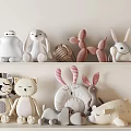 Cute Plush Toys Collection With Lion Cat Rabbit Balloon Dog And Yarn Ball On Shelf