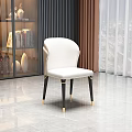Modern White Leather Dining Chair With Curved Backrest Black Legs Golden Accents
