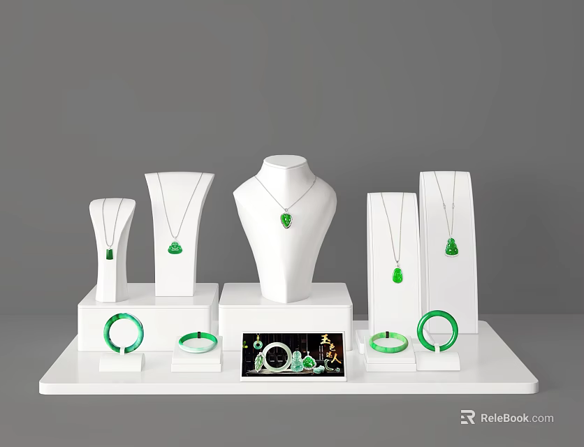 Elegant Green Jewelry Collection with Necklaces Pendants and Bracelets on White Display Stand 3d model 