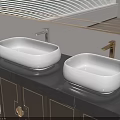 Two White Above Counter Washbasins With Gold Silver Faucets On Black Countertop And Dark Cabinets