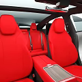Silver Electric Sedan With Red Seats And Modern Sleek Autonomous Design