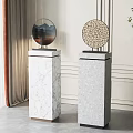 Elegant Decorative Ornament Set With Circular Designs On Marble Pedestals For Interior