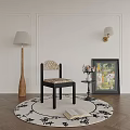 Elegant Dining Chair With Wicker Seat Black Frame Round Rug Floor Lamp And Wall Sconce