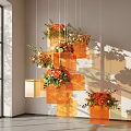 Hanging Orange Flower Arrangements In Transparent Square Containers With Soft Light Shadows
