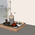Classic Tea Set With Brown Teapot Gray Container And Potted Plant On Wooden Tray