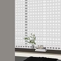 Modern White Window Blinds In Interior With Potted Plant And Stacked Books