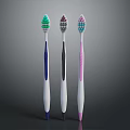 Three Different Colored Toothbrushes With White Brush Heads And Colored Bristles For Daily Use